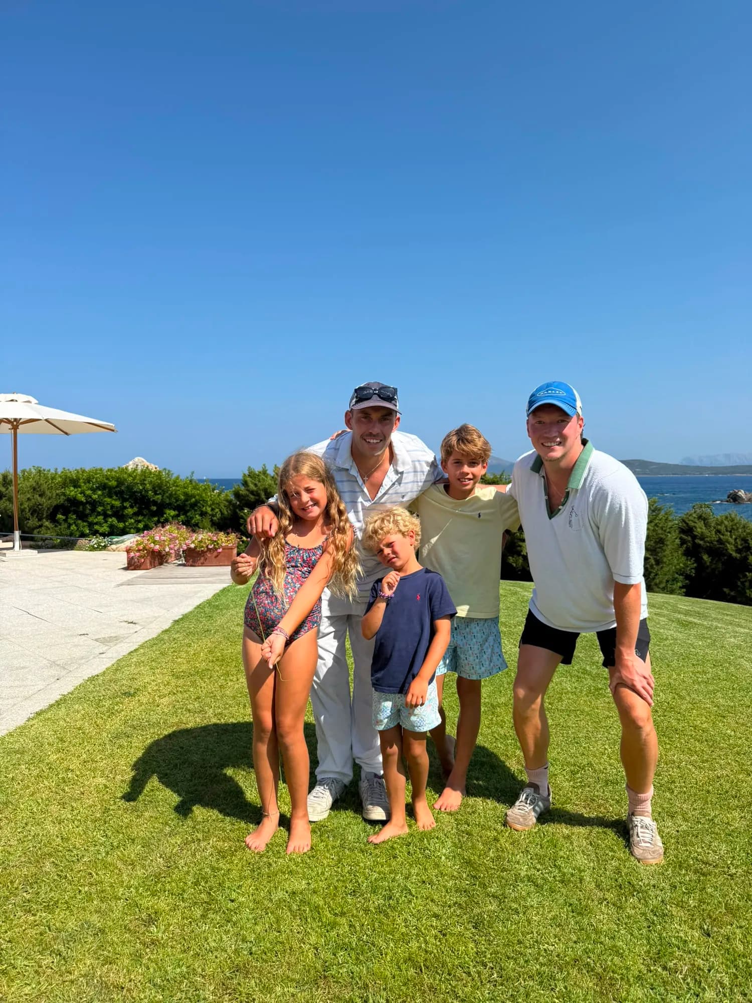 A family together on the lawn with their Holiday Heroes